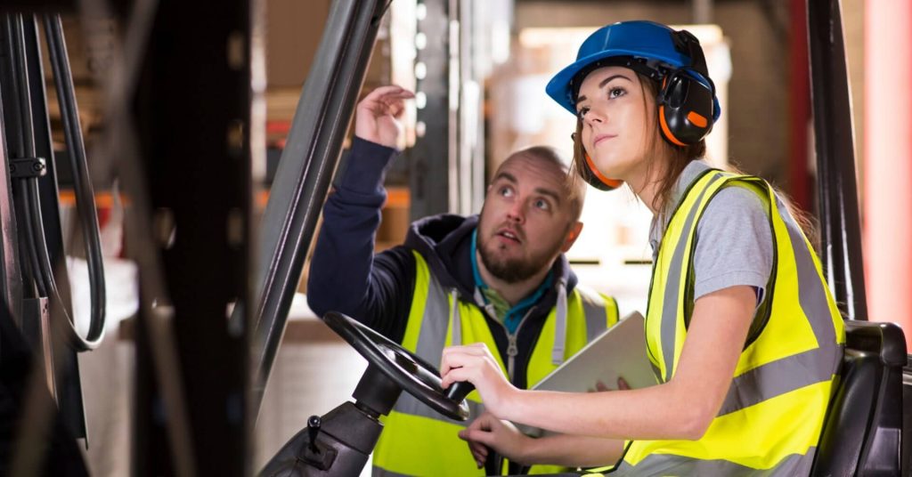Forklift operator training course with a counterbalance forklift in a warehouse